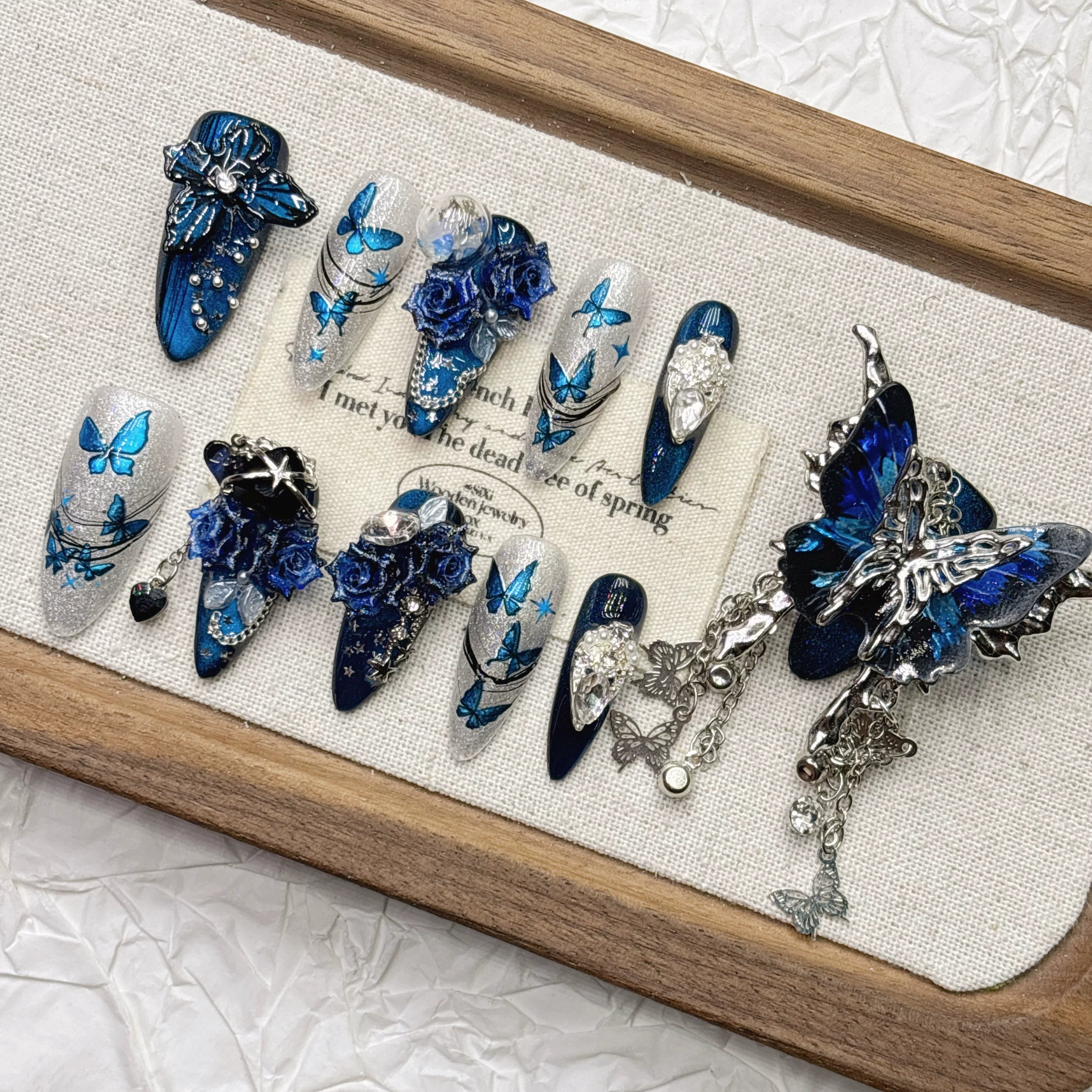 Blue 11-finger butterfly pure hand-worn armor heavy industry nail art boutique high-end goods handmade 2026 New Year's medium and long models