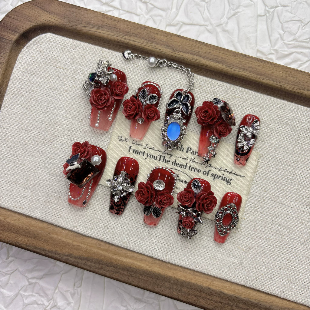 Dark red rose pure hand-worn nail, high-end feeling, cool and handsome nail art 2026 New Year's new product medium and long pointed model