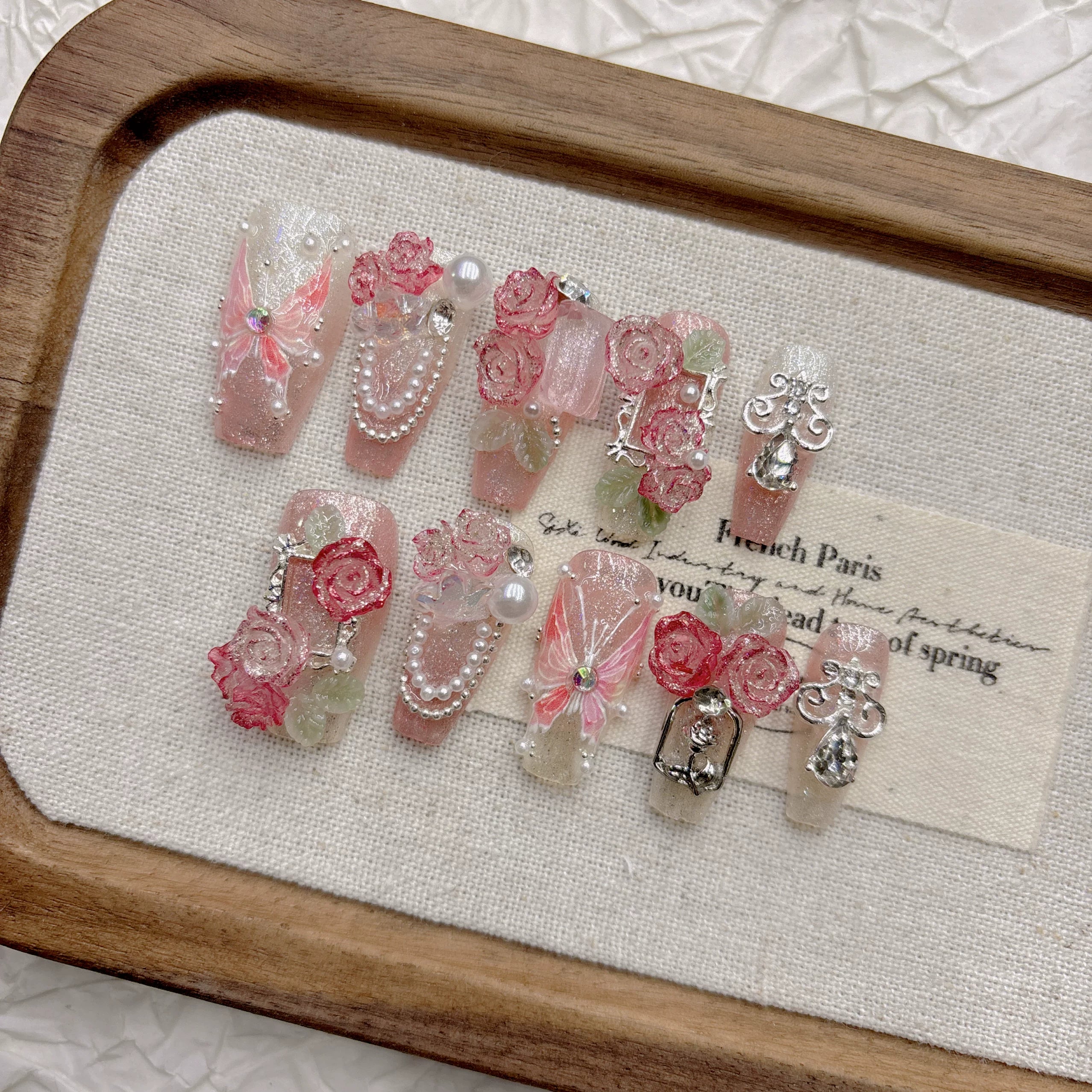 Pink butterfly handmade armor French gentle high-end niche white 2026 new medium and long models