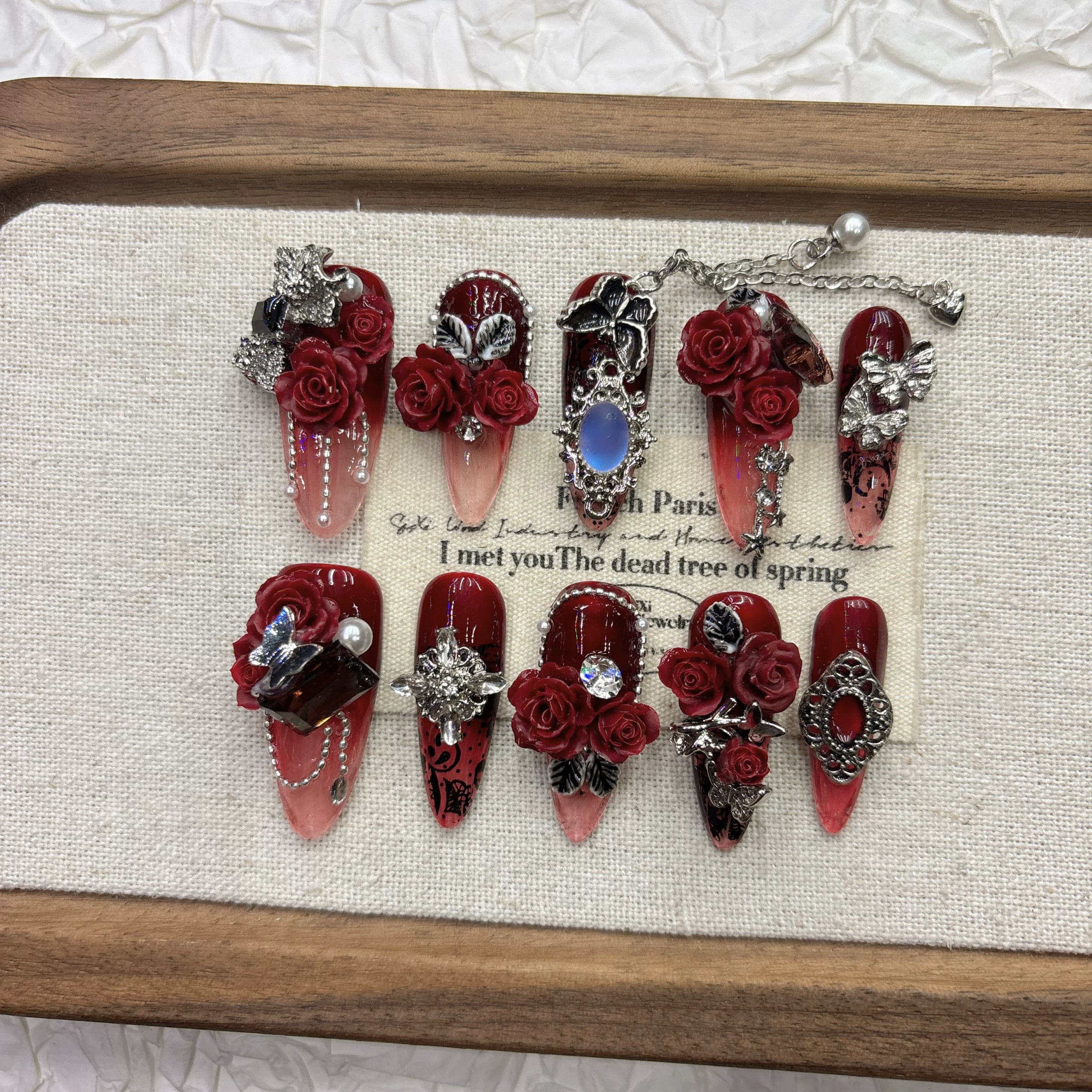 Dark red rose pure hand-worn nail, high-end feeling, cool and handsome nail art 2026 New Year's new product medium and long pointed model