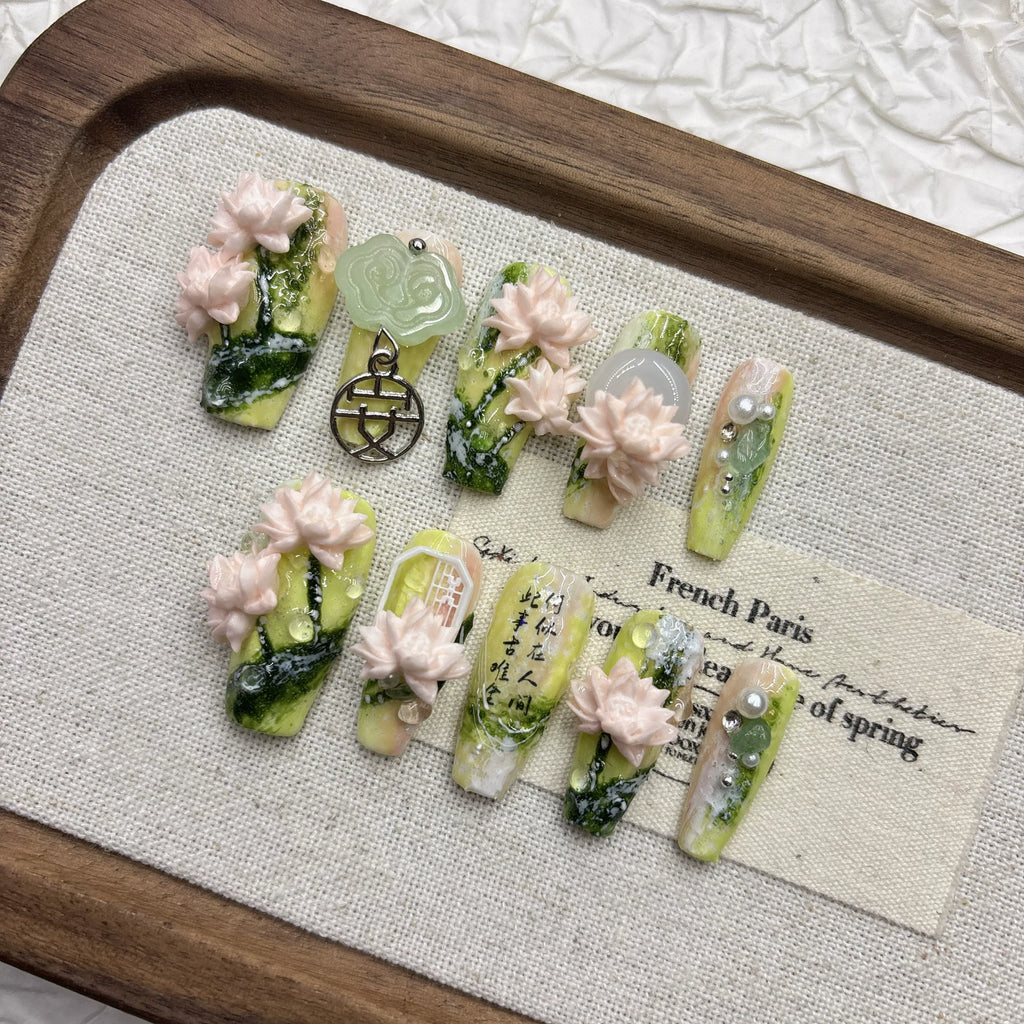 Spring green lotus manicure, pure hand-worn armor, national style relief three-dimensional light luxury 2026 new medium and long models