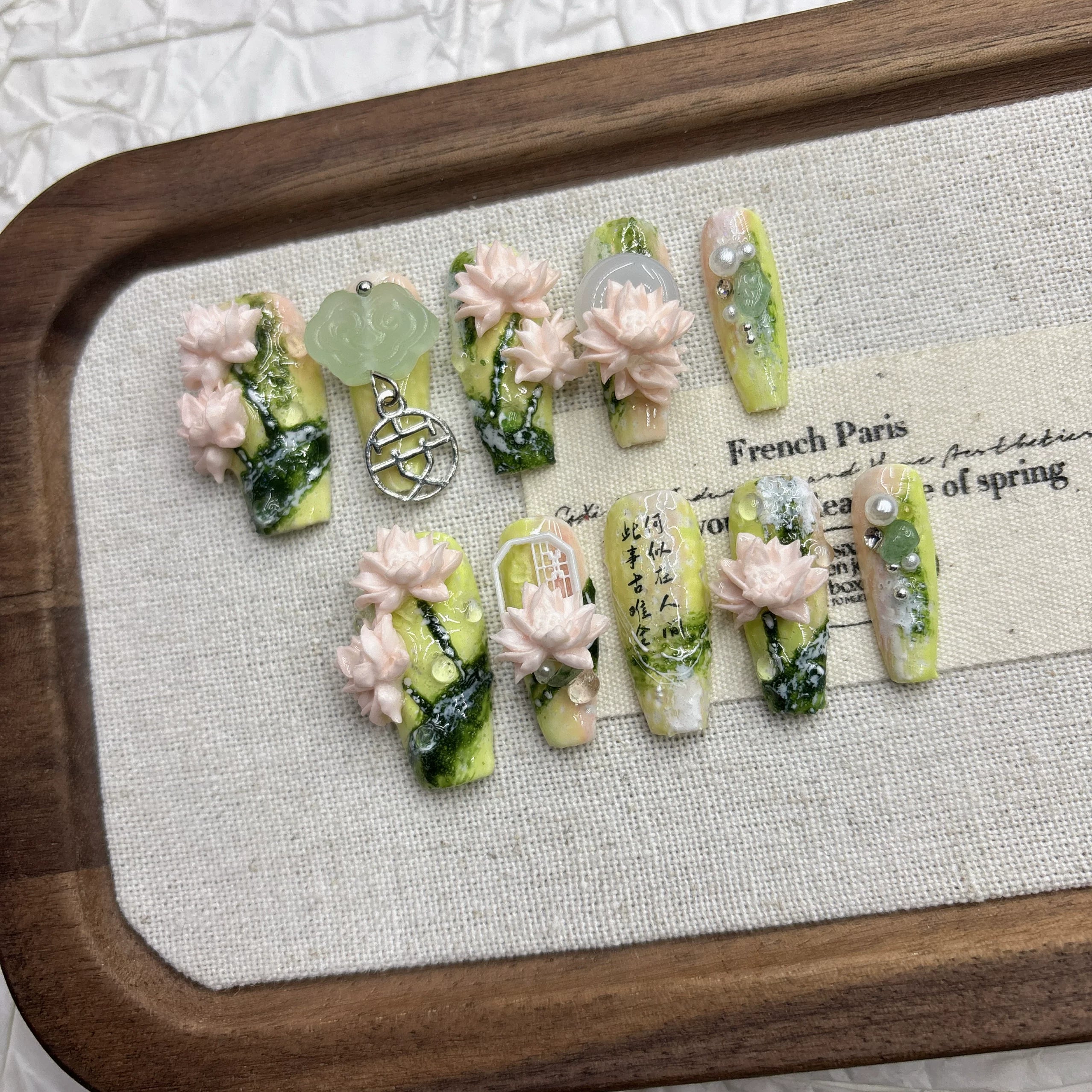Spring green lotus manicure, pure hand-worn armor, national style relief three-dimensional light luxury 2026 new medium and long models