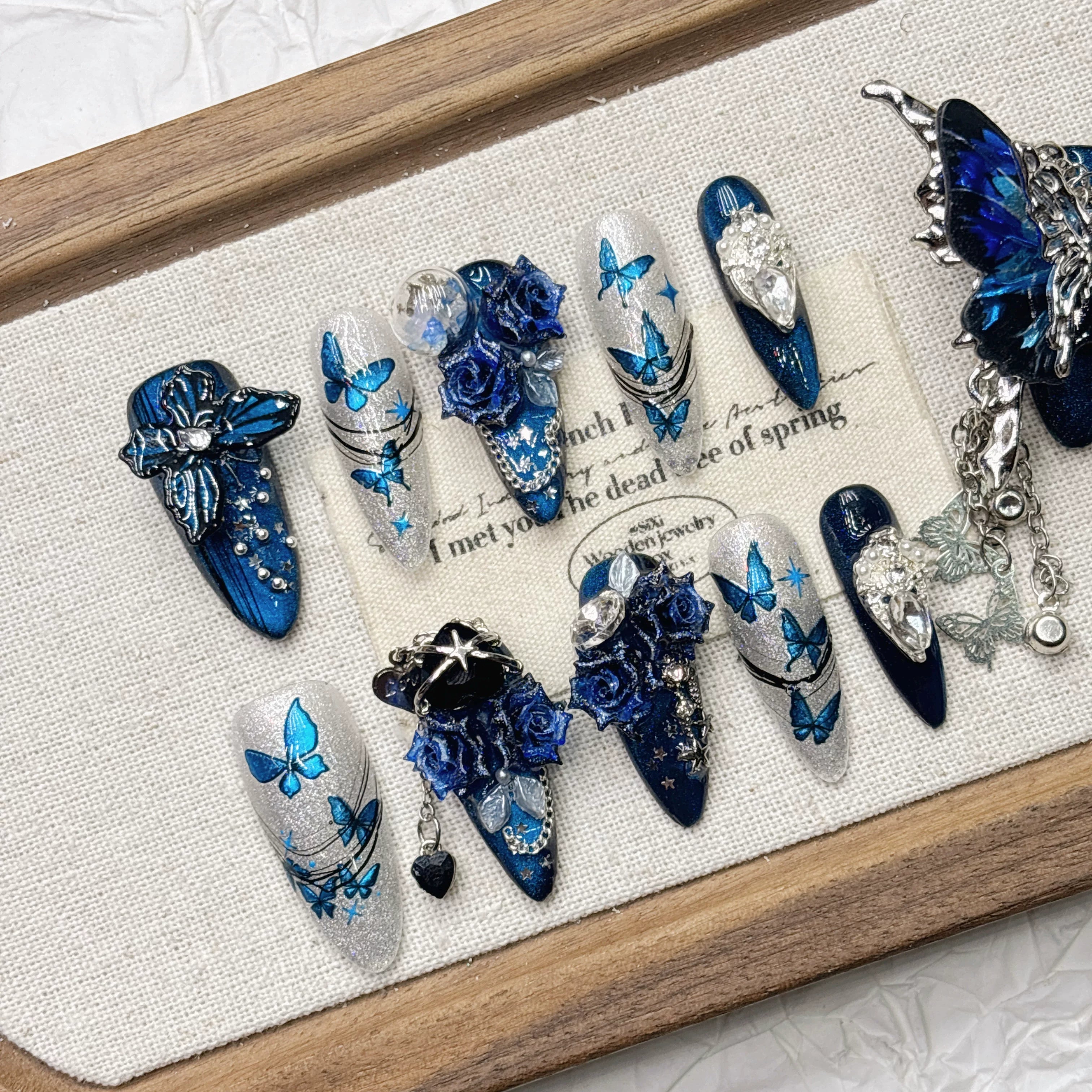 Blue 11-finger butterfly pure hand-worn armor heavy industry nail art boutique high-end goods handmade 2026 New Year's medium and long models