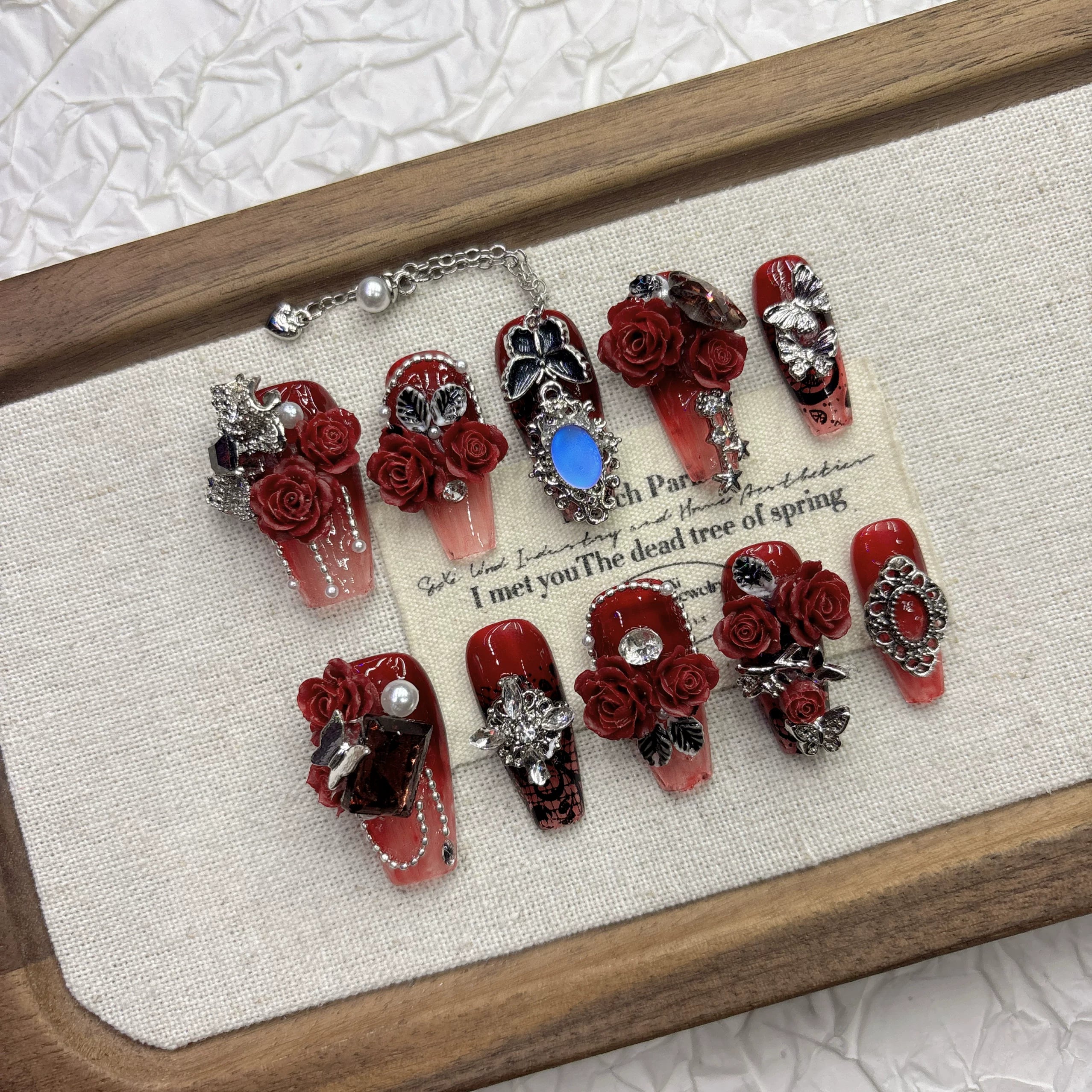 Dark red rose pure hand-worn nail, high-end feeling, cool and handsome nail art 2026 New Year's new product medium and long pointed model