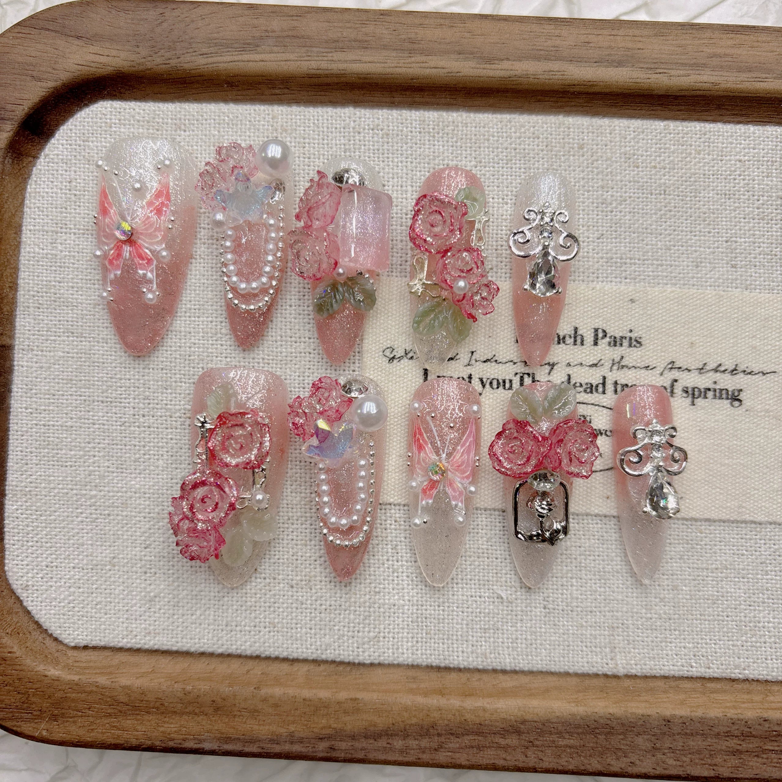 Pink butterfly handmade armor French gentle high-end niche white 2026 new medium and long models
